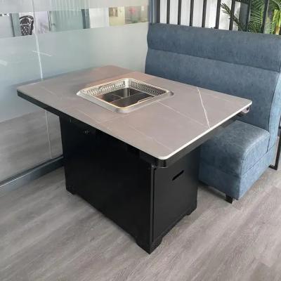 China Electric Modern Commercial Restaurant Smokeless Hot Pot Table With Hot Pot Induction Cookers for sale