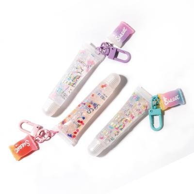 China Non Toxic Fruit Flavored Little Girls Lip Gloss With Shimmering Glitter for sale