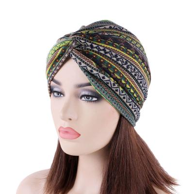 China Fashion Bohemian twist wrap turban head hats Indian polyester cross slouch hat warm head hats for women for sale