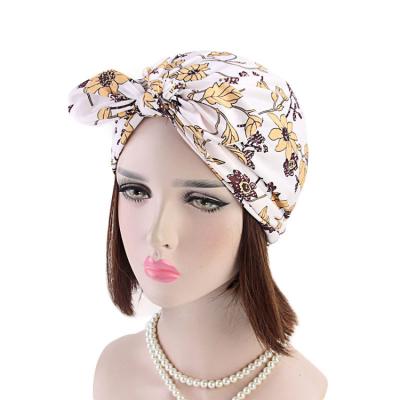 China Fashion Vintage African Girls Flower Print Bow Head Beanie Cap Muslim Stretch Cotton Turban Hat for sale