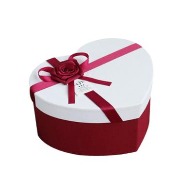 China Recycled Materials Custom Heart Shaped Gift Box With Ribbon Cosmetics Box for sale