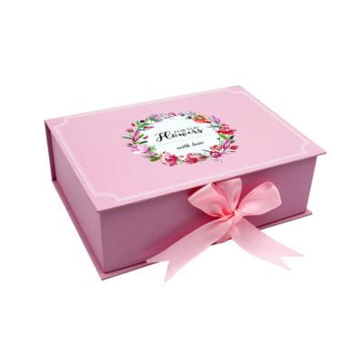 China Recycled Materials Luxury Book Shape Magnetic Gift Boxes With Ribbon For Cosmetic And Gift for sale