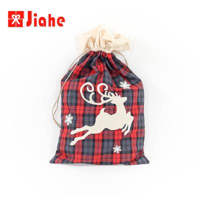 China New Pattern Drawstring Polyester Christmas Drawstring Gift Bag for sale