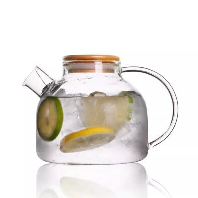 China 1000ml 1600ml High Capacity Sustainable Teapot Borosilicate Glass Transparent Water Jug With Bamboo Lid for sale