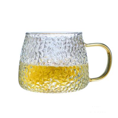 China Hammer Retro Japanese Style Heat Resistant Tea Drink Mugs Viable Handmade Glass Tea Cup With Gold Handle for sale