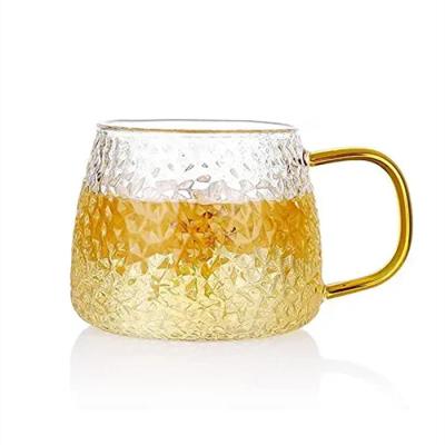 China Durable Heat Resistant Hammer High Borosilicate Glass Tea Mug With Gold Handle For Household Beer Juice Mug for sale