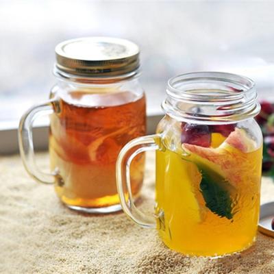 China Modern Square Masks Mason Jar Glass Drinking Mugs With Straw And Screw Lids for sale