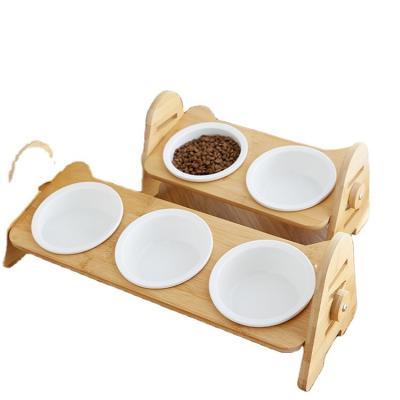 China Automatic Wholesale Luxury Anti Ant Pet Cat Raised Water Wooden Dog Food Wooden Dog Food Rack Luxury Elevated Slanted Ceramic Bowl for sale