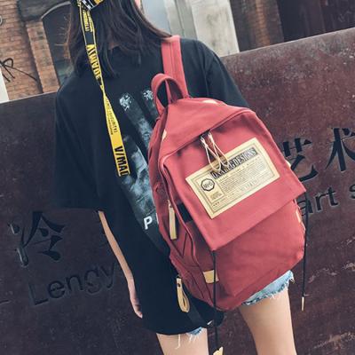 China Custom new wholesale fashion Korean school boys custom canvas shoulder bag female large capacity travel backpack for sale