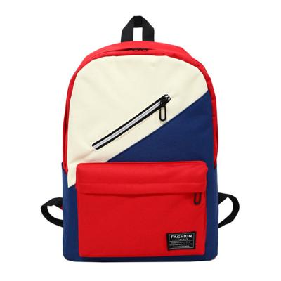 China New Oxford waterproof cloth bag fashion cool slant zipper color students outdoor backpacks for sale