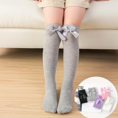 China Bright Color Little Girl Slouch Slouch Breathable Hot Sale Kids Socks School Booties Girl Children Knee High Socks With Bow for sale