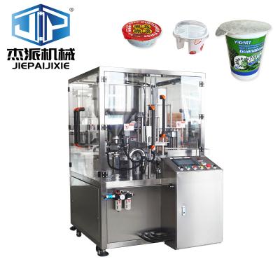 China 380V Automatic Jam Dairy Products Cup Filling And Sealing Machine With Hopper Temperature Control for sale