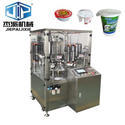 China Easy Handling Cheese Cream Cup Filling And Sealing Machine 1.3KW Power With Hopper for sale