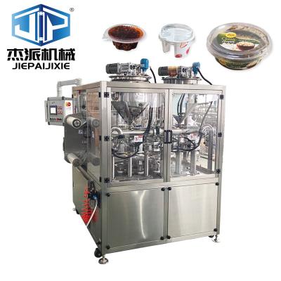 China Touch Screen Gas Flushing Plate Top Liquid/Sauce Filling Sealing Machine For Food Packaging for sale