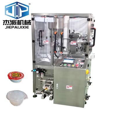 China Precision Rotary Cup Filling Sealing Machine For Density / Viscous Liquids for sale