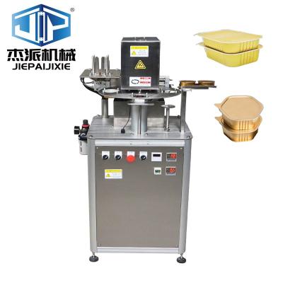 China 1.8kw Silver Rotary Tray Sealing Machine For Eco Friendly Food Packaging for sale