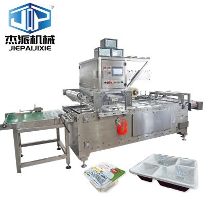 China 380V Reliable Automatic Tray Sealing Machine With PLC Control Panel for sale