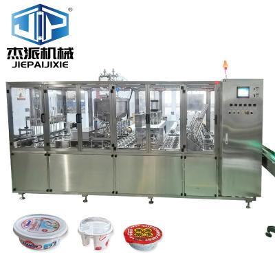 China Economical Cup Filling And Sealing Machine Capable Of Packaging Liquid And Semi Liquid Items for sale