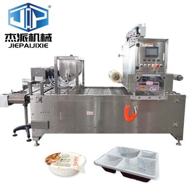 China PLC Control System Silver Automatic Tray Sealing Machine For Food Containers for sale