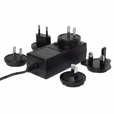 China ABS+PC Flame Retardant Material 5W 12W 24W 36W 45W Interchangeable AC Power Adapter With US EU UK AU Plug for sale