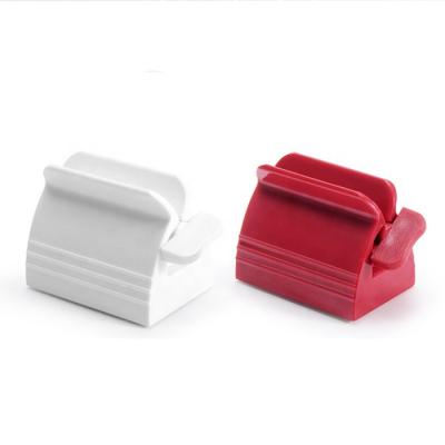 China Creative Manual Lazy Toothpaste Clip Kids Bathroom Accessories Viable Toothpaste Squeezer Lazy Dispenser for sale