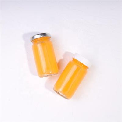 China High Clear Food Grade Small Cylinder Glass Jar Food Grade For Food Honey Jam Sauce Juice With Closure for sale