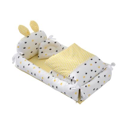 China New Modern Adjustable Cotton Cloth Baby Crib and Washable Cartoon Cute Bionic Crib Hutch Set for sale