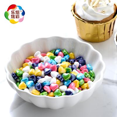 China For factory direct wholesale edible color confetti bakery decoration mix rainbow pearlized hearts in 1kg bag for bakery decoration for sale