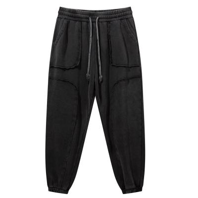 China Anti-wrinkle Spring and Autumn Loose Casual Sports Ankle Banded Pants Solid Color Elastic Waist Pants for sale