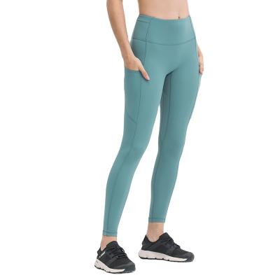 China MOQ Size Fitness Solid Color Gym Yoga Breathable High Low Leggings For Women With Phone Pocket for sale