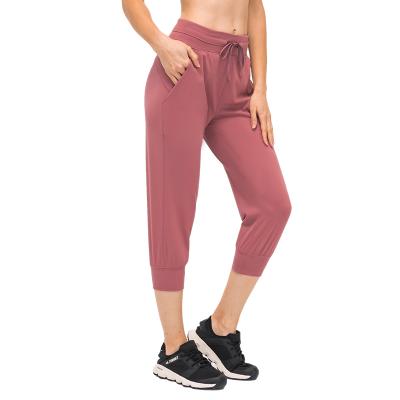 China 2021 Breathable Customize Comfortable Loose Nylon Spandex Flared Girls Cropped Yoga Wear Leggings for sale