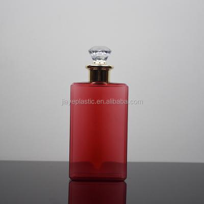 China Personal Care Customize Rectangle 250ml Red Color Empty Perfume Bottle With Diamond Cap for sale