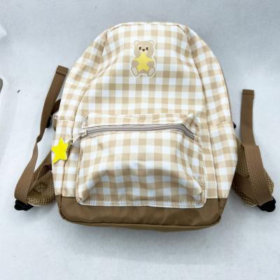 China Latest Designs Waterproof Wholesale Custom Handbags And School Bags Waterproof School Bag Kids Backpack for sale