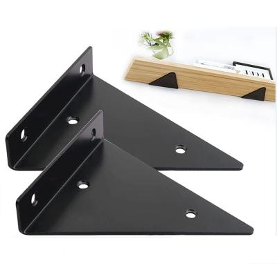 China Stamping Punching Bending Heavy Duty Black Corner Stand for Minimalist Home Decor for sale