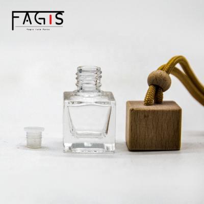 China Fashion Accessories Manufacturer 5ML Square Empty Glass Perfume Bottle Cap Cylinder Bottle Car Wooden High End Perfume for sale