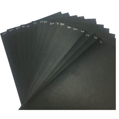 China Anti-Bending Wholesale Roll Paper 70*100cm Black Kraft Board Black Liner Board for sale