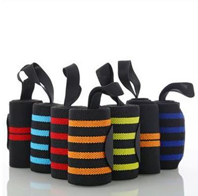 China Adjustable Elasticity Breathable Professional Sports Bandage Wrap Wrist Guard Badminton Weightlifting Skate Wrist Guards for sale