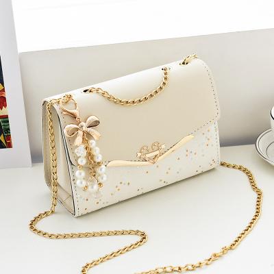 China Fashion Gold Chain Strap Ladies Designer Elegant Soft Bags Girls Shape Bowknot-Decoration Confetti Purse Cross Body Messenger for sale