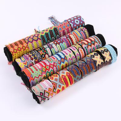 China Colorful Geometric Cotton String Nepal Bracelet Design Cotton Rope Pattern Braided Bracelet for sale