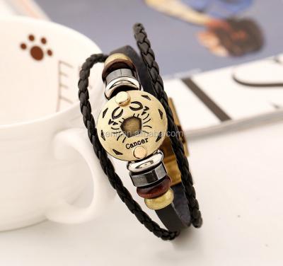 China Leather+cord+alloy vintage zodiac leather braclet for gift leather buckle bracelet wholesale for sale