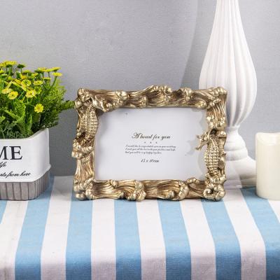 China Europe Wall Display Photo Gallery Beach Style Polyresin Gold Table Decorative Picture Frame for sale