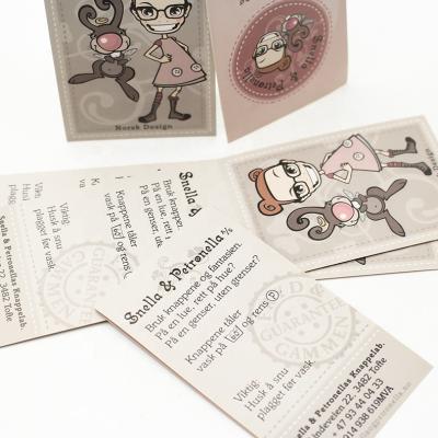 China Newest Sustainable Paper Perforated Customize High Quality Gloss Hang Tag à venda