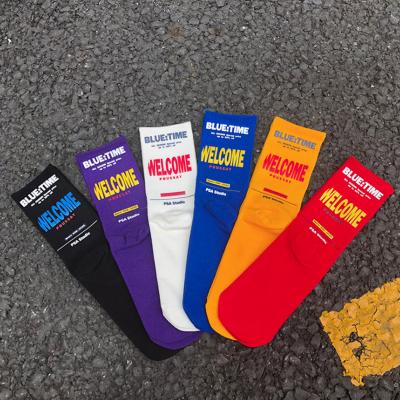 China Wholesale QUICK DRY Mens Bright Color Funny Letter Crew Cotton Cool Hip Hop Skate Socks for sale