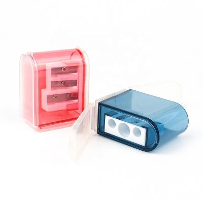 China 2022 New School 3 Holes Rectangle Shaped Plastic Pencil Sharpener Colorful Transparent With 3 Soles for sale