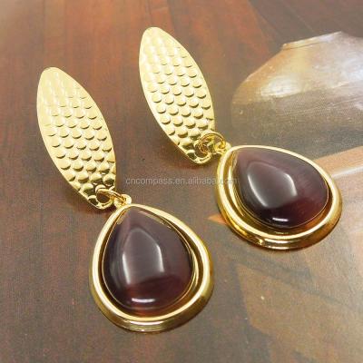 China Ethnic Hot Selling Gold Color Cat Eye Pendant Dangling Earring Stainless Steel Earrings for sale