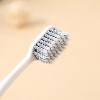 China Disposable Couple Toothbrush Travel Toothbrush Adult Single Clean Black And White Package Clean Wide Head Soft Toothbrush for sale