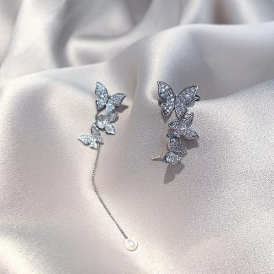 China Fashionable Silver Asymmetric Butterfly Rhinestone S925 Long Needle Stud Earrings for sale