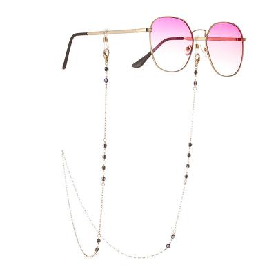 China Trendy Trendy Blue Eyes Beaded Sunglasses Chain Earpiece Anti Lost Lanyard Gold Plated Masking Chain For Man Women for sale