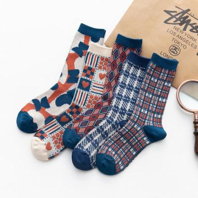 China Retro antibacterial British wind tube socks autumn and new winter style women's fashion thousand bird lattice pile socks for sale