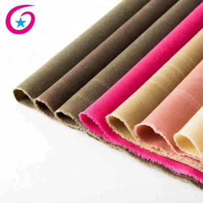 China Waterproof 389gsm 8oz Wet 100% Cotton Oil Waxed Linen Fabric In Stock Fabric for sale